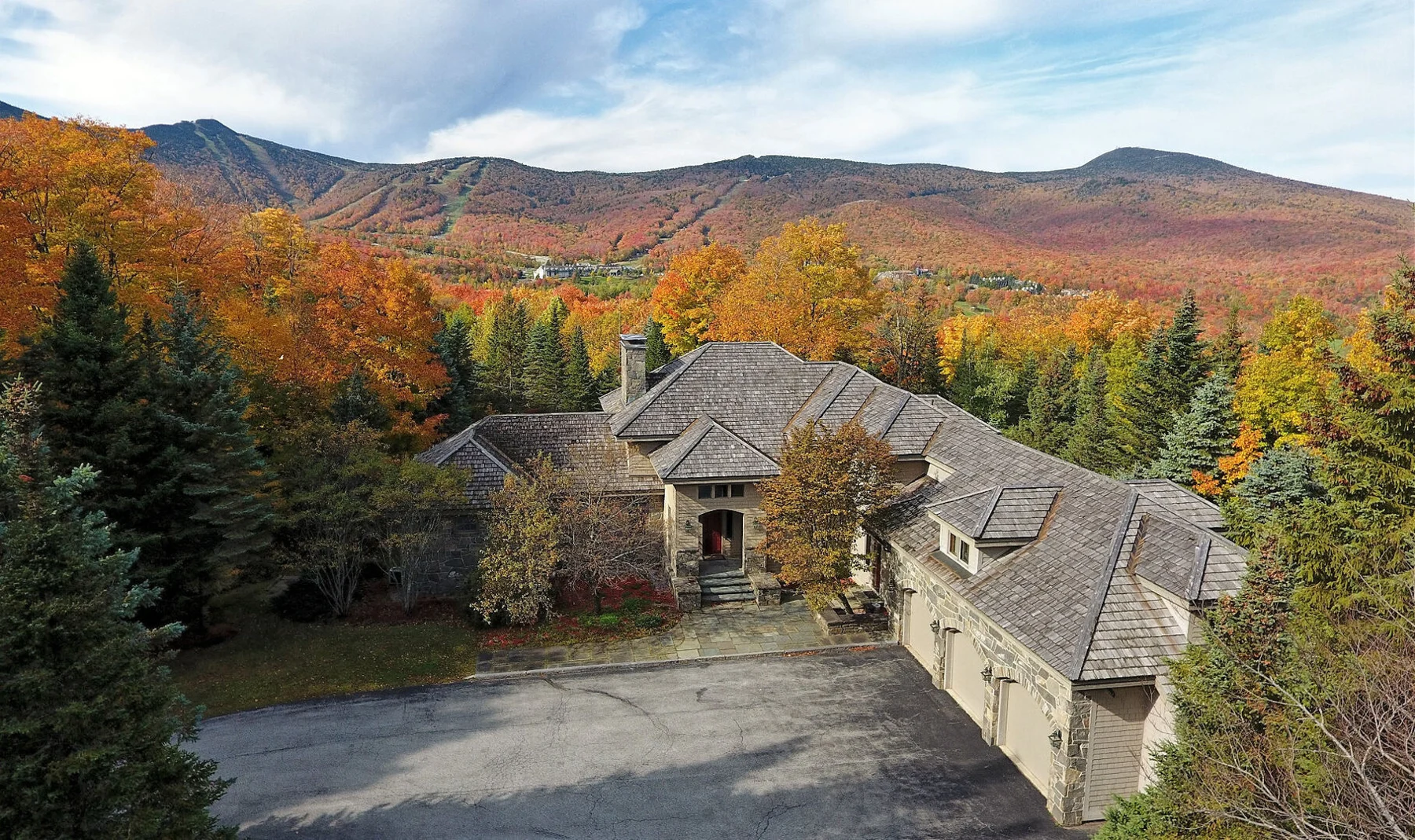 The Mountainside House beneath autumn foliage on Killington Mountain